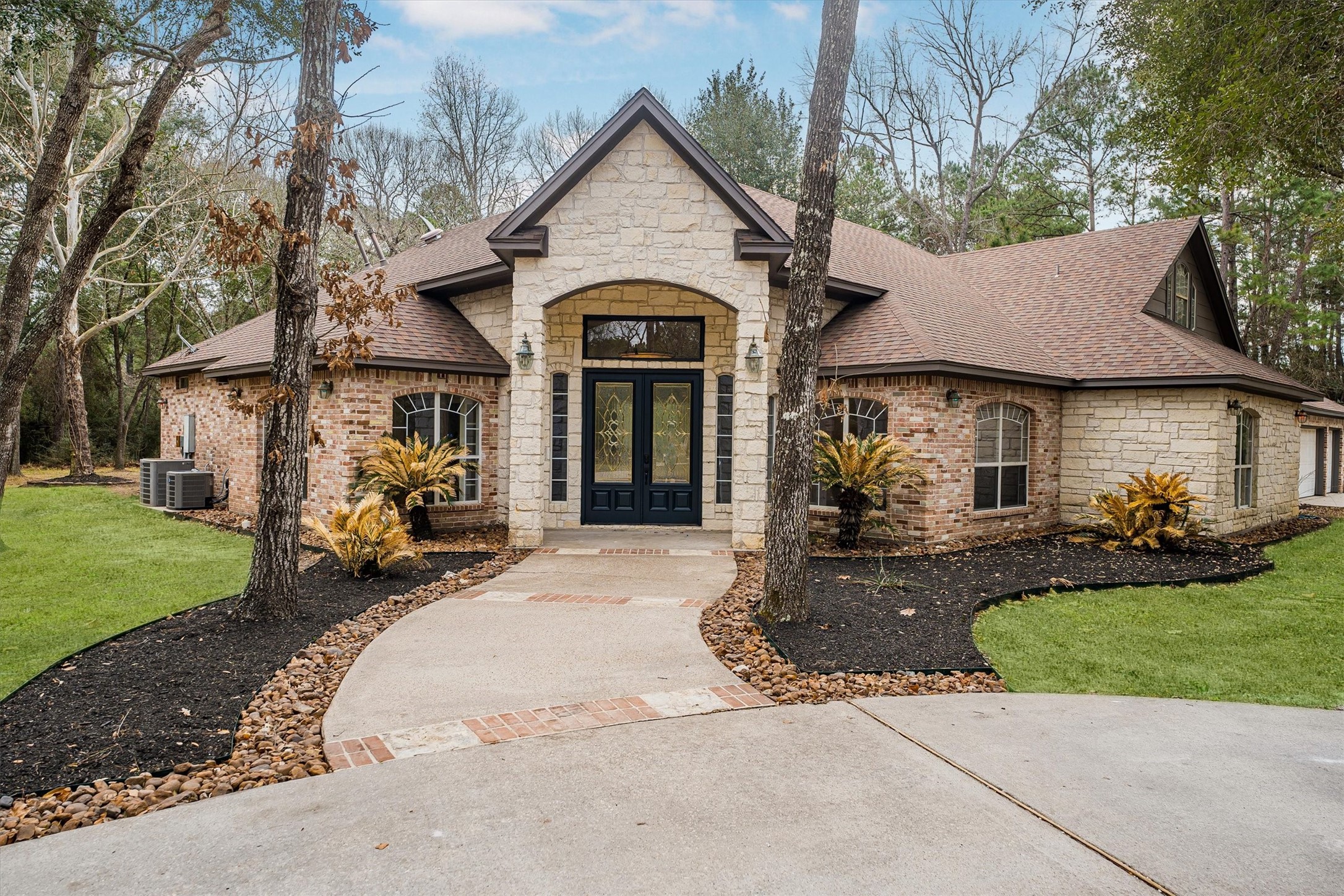 111 Whispering Meadow Magnolia, TX 77355 - Photo 17 of 49 Front of home is beautiful and inviting