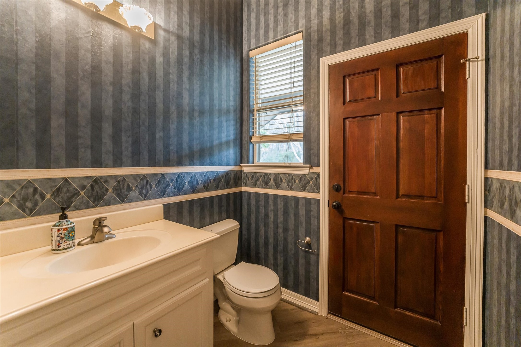 111 Whispering Meadow Magnolia, TX 77355 - Photo 39 of 49 Powder Room with door to covered porch