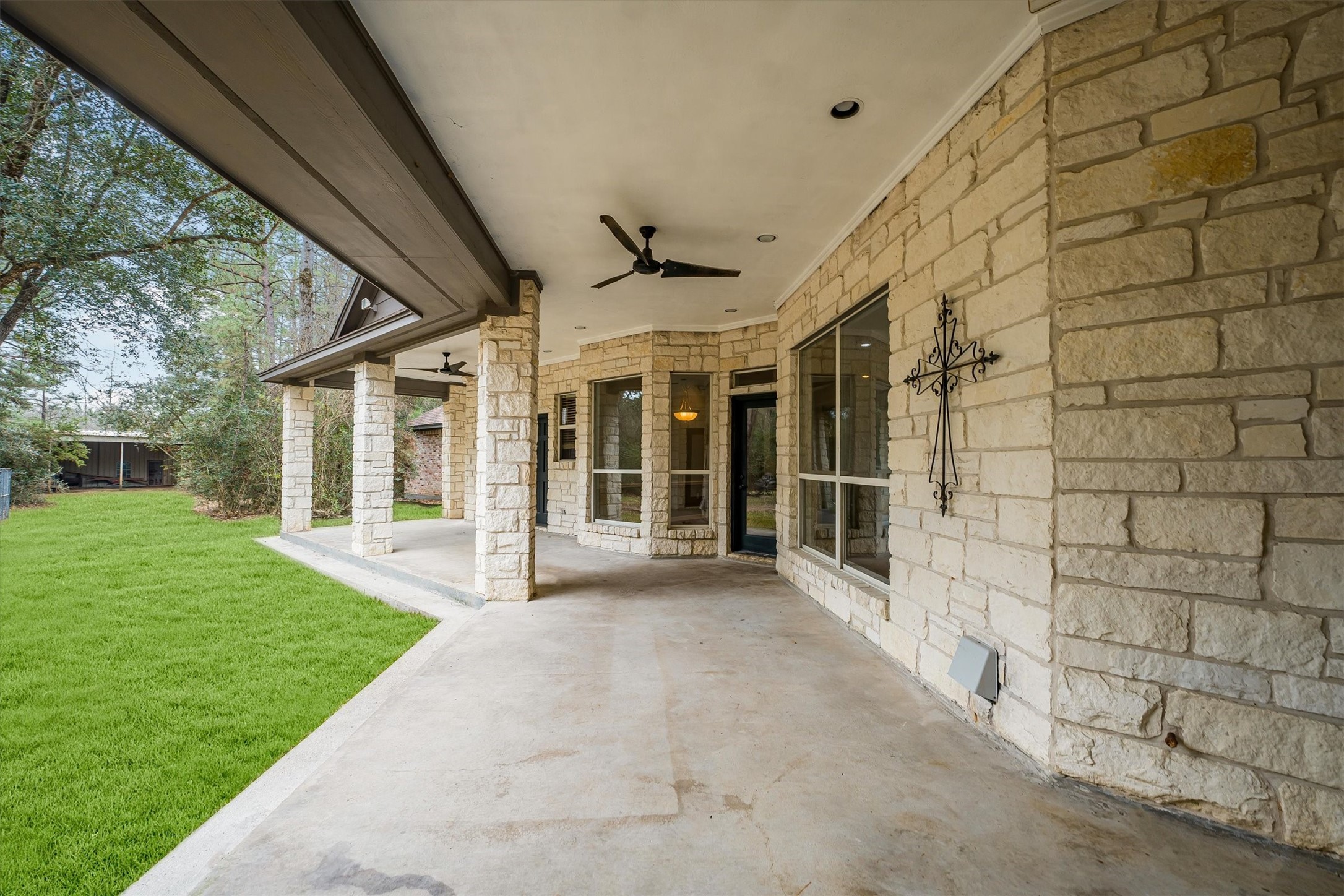 111 Whispering Meadow Magnolia, TX 77355 - Photo 9 of 49 Porch accessible from living, breakfast, master and half-bath