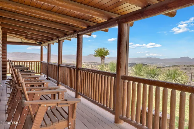 a large kitchen with a table and chairs