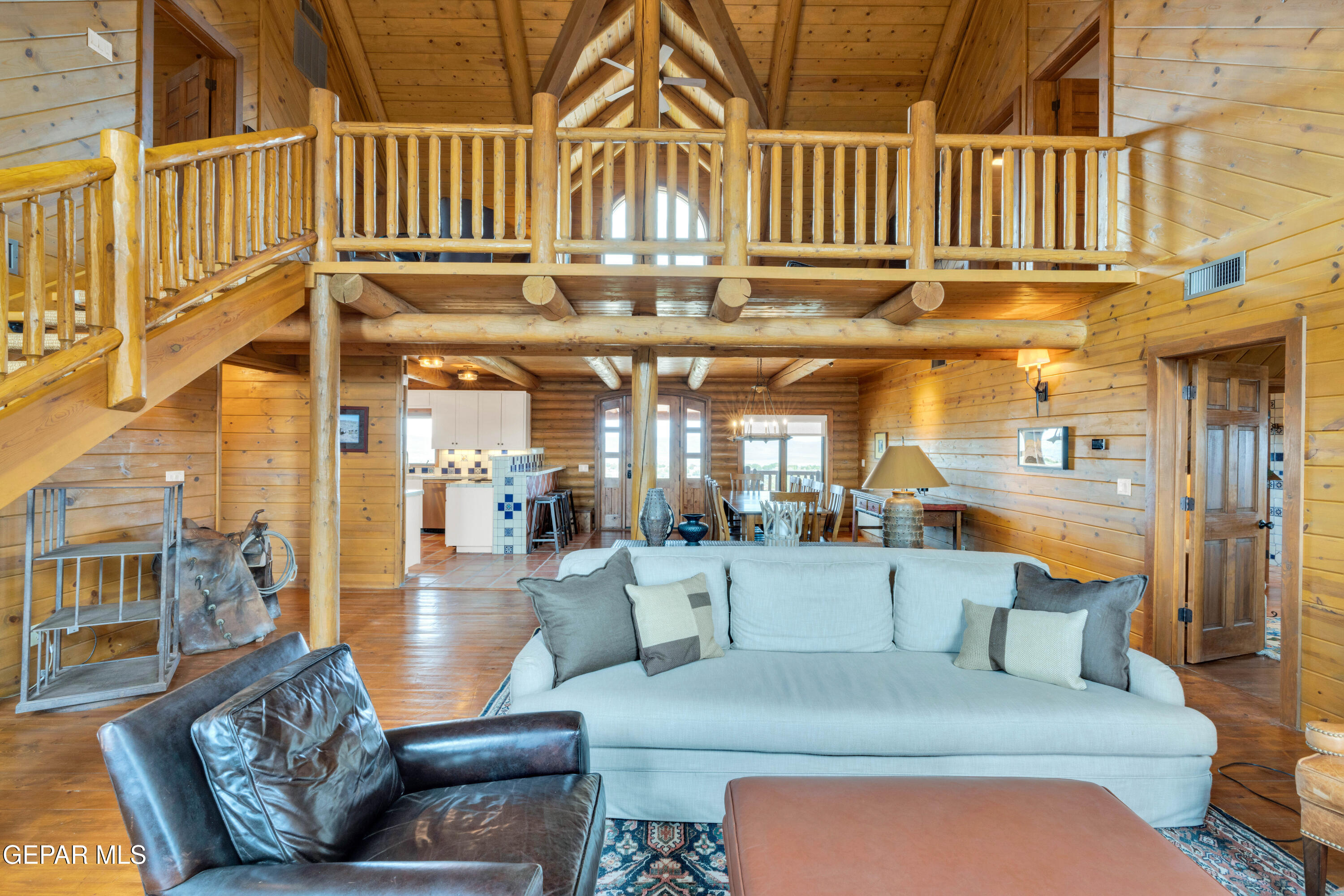 2 Scenic Ridge Road South Alpine, TX 79830 - Photo 21 of 57 a living room with fireplace furniture and a rug