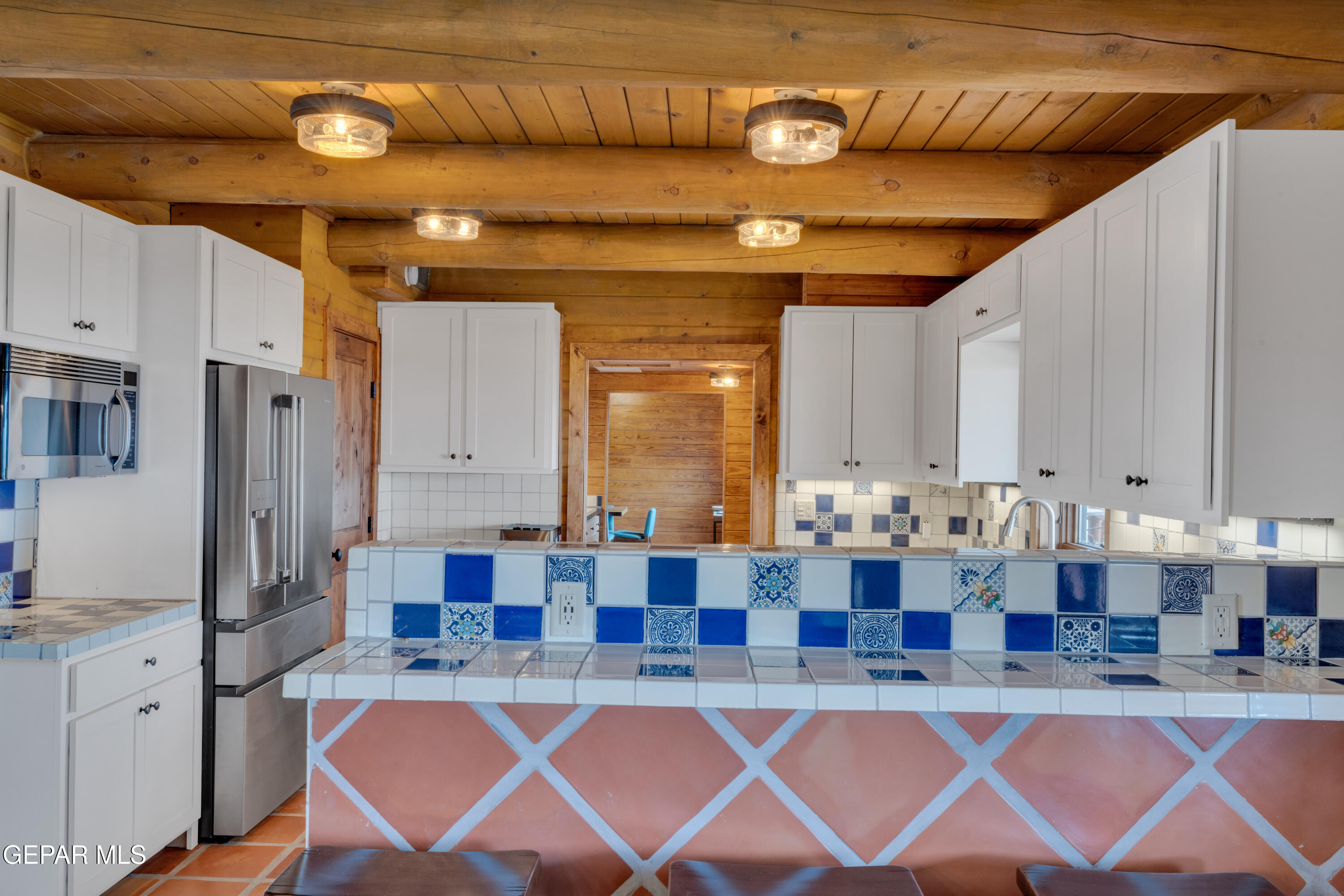2 Scenic Ridge Road South Alpine, TX 79830 - Photo 5 of 57 a large kitchen with a table and chairs