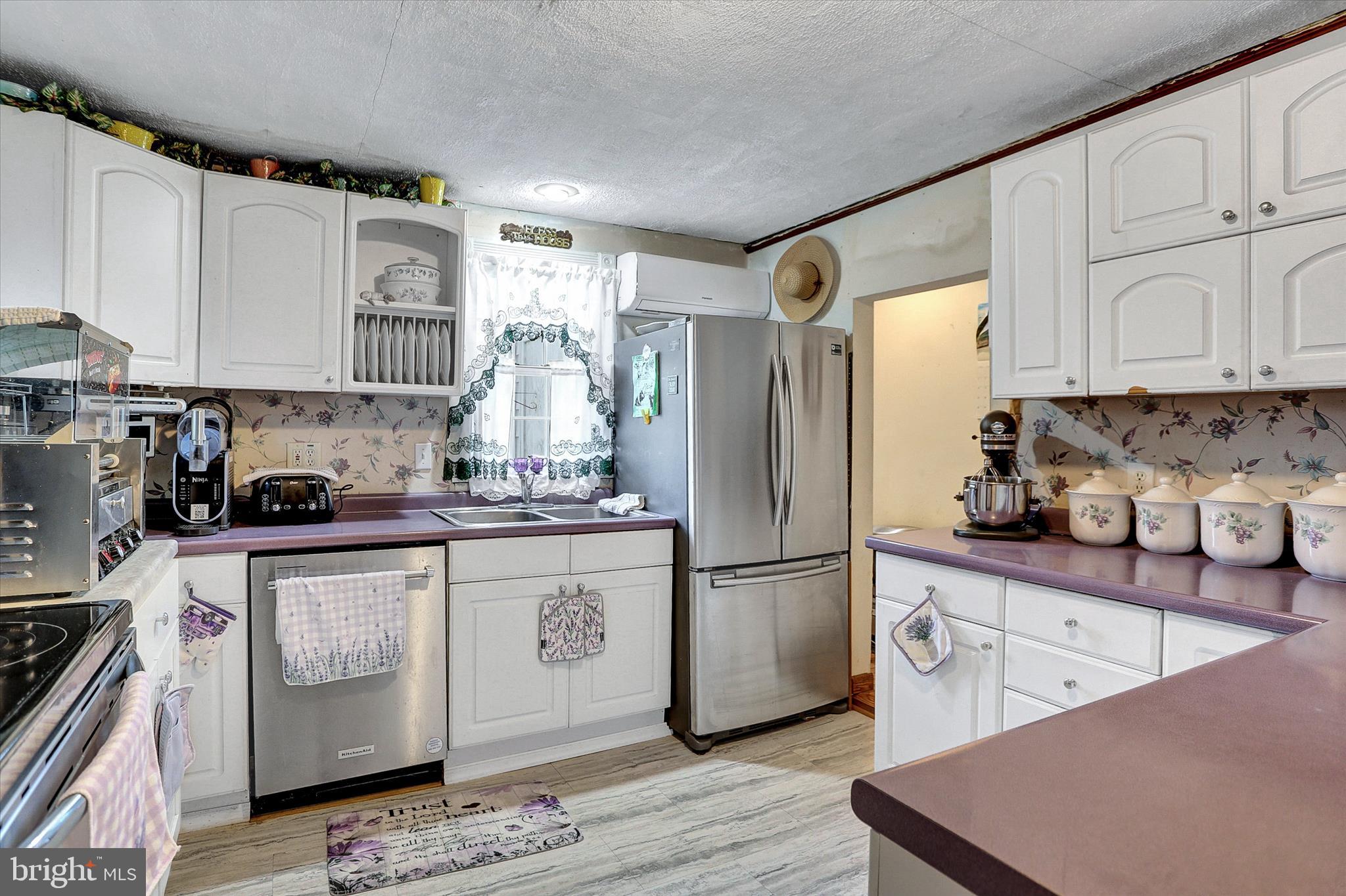 122 Shippensburg Road Newburg, PA 17240 - Photo 13 of 76 a kitchen with stainless steel appliances granite countertop a refrigerator sink and cabinets