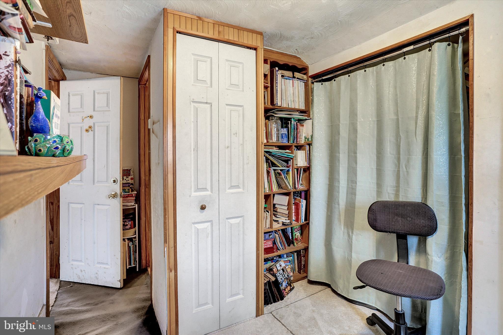 122 Shippensburg Road Newburg, PA 17240 - Photo 20 of 76 a view of a hallway with front door and wooden floor
