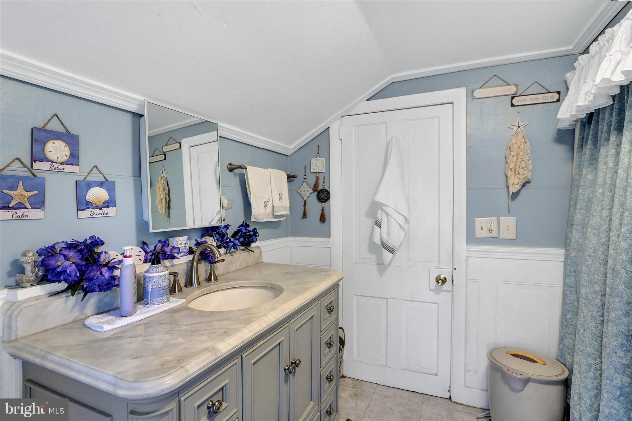 122 Shippensburg Road Newburg, PA 17240 - Photo 28 of 76 a bathroom with a granite countertop sink a toilet and shower curtain