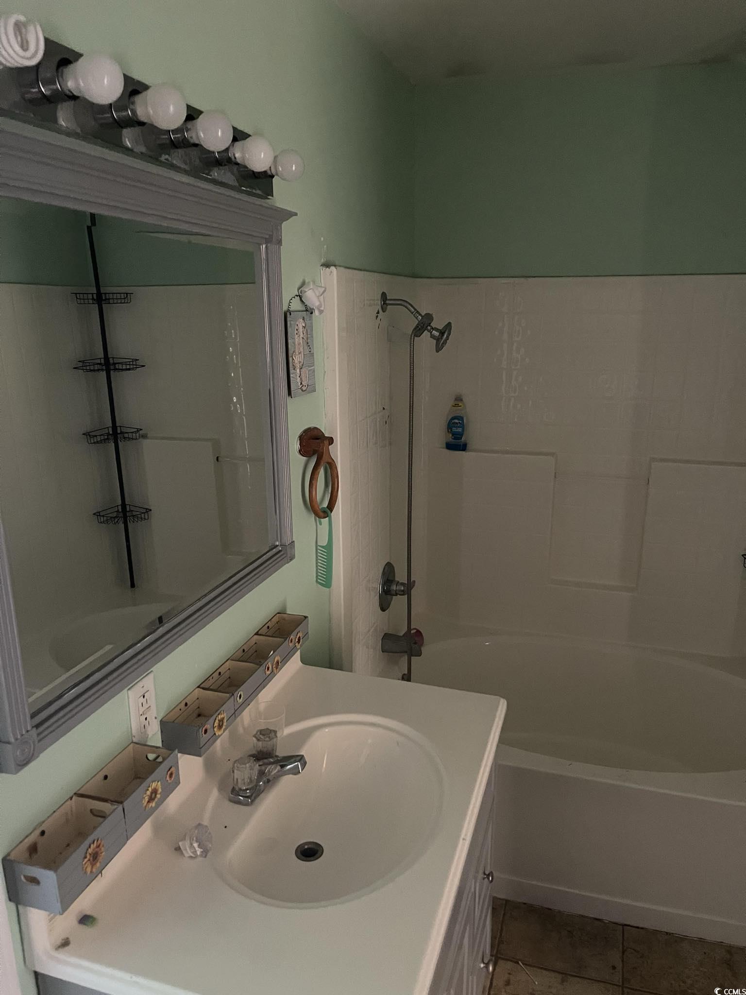 1353 Moss Street Georgetown, SC 29440 - Photo 12 of 32 Bathroom with shower / washtub combination, tile p