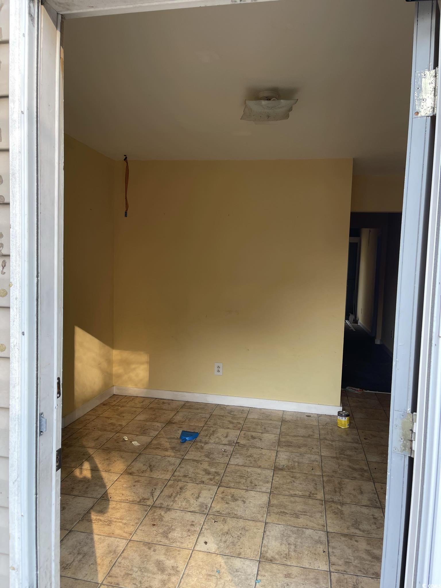 1353 Moss Street Georgetown, SC 29440 - Photo 16 of 32 Unfurnished room featuring tile patterned flooring