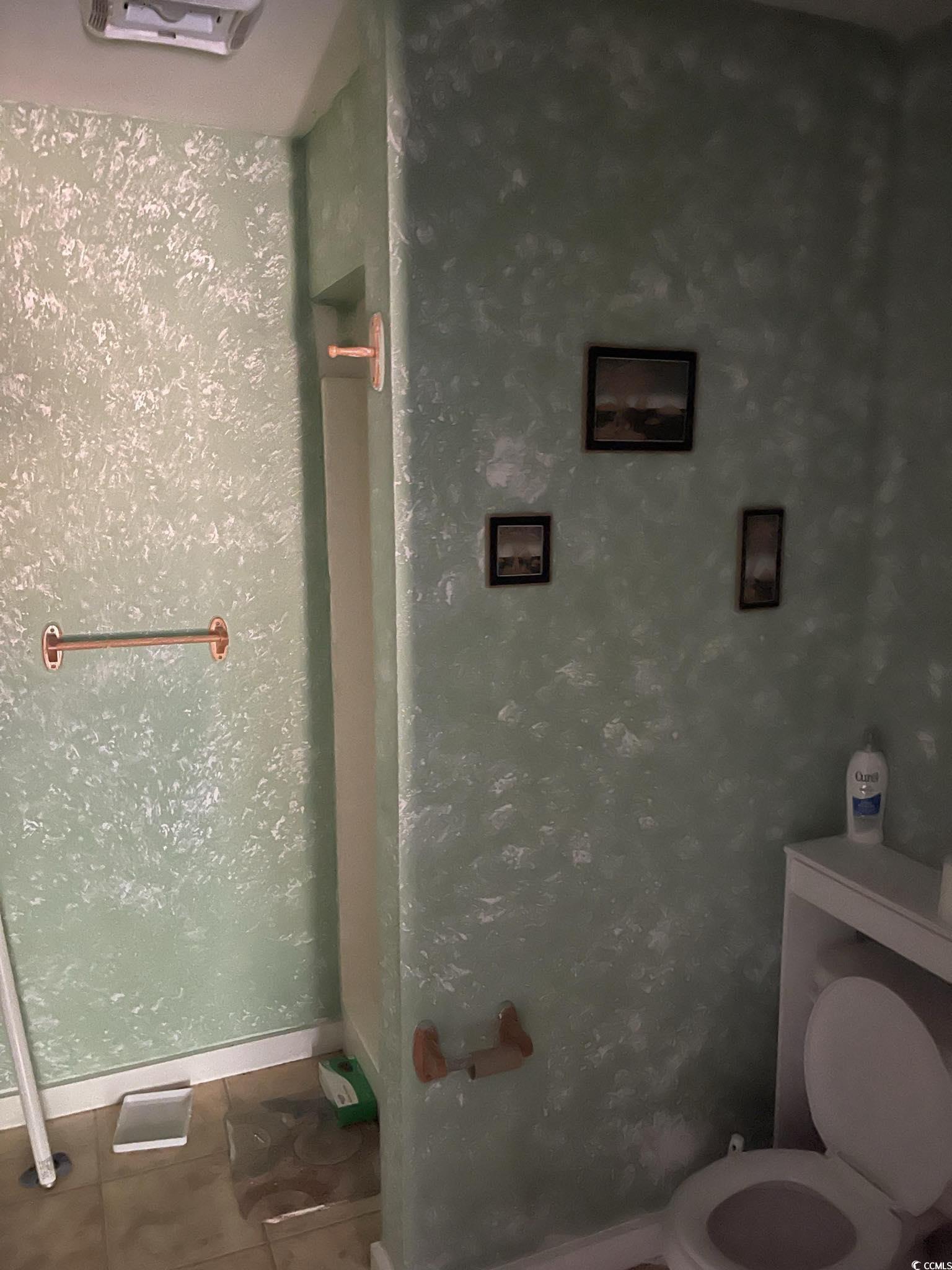 1353 Moss Street Georgetown, SC 29440 - Photo 30 of 32 Bathroom with tile patterned flooring and toilet