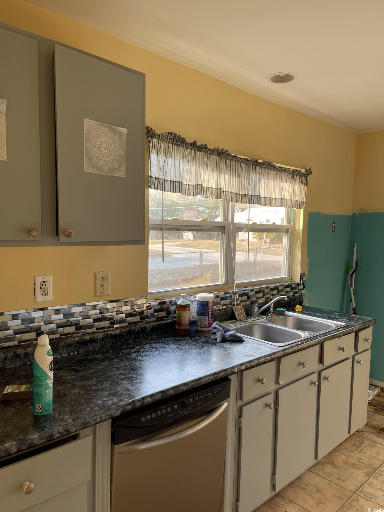 1353 Moss Street Georgetown, SC 29440 - Photo 31 of 32 Kitchen with sink, dishwasher, white cabinets, lig