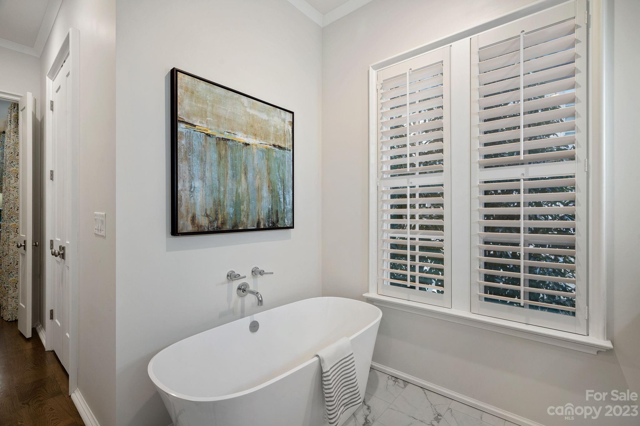1401 Audubon Road Charlotte, NC 28211 - Photo 18 of 39 a bathroom with a bathtub and a sink