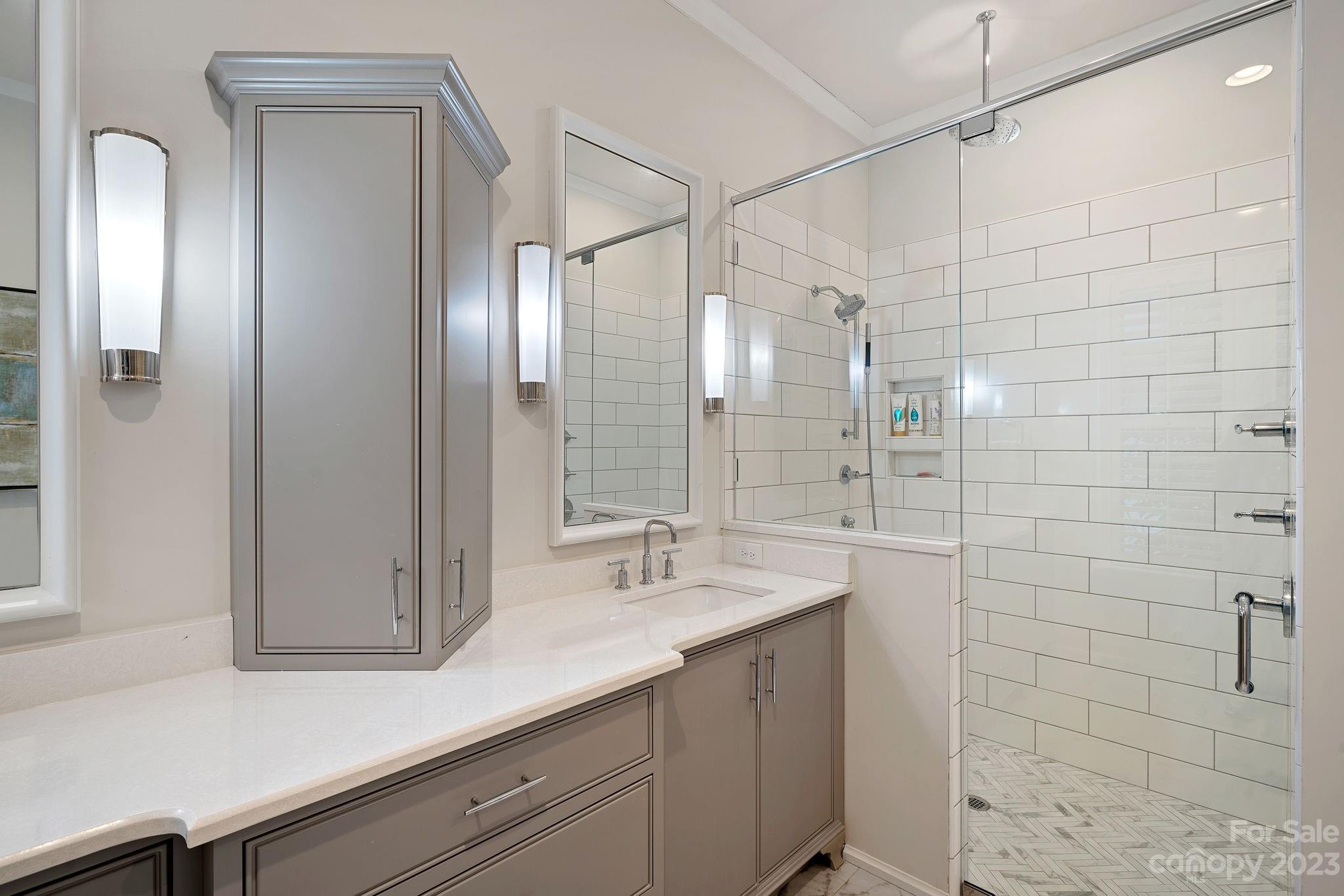 1401 Audubon Road Charlotte, NC 28211 - Photo 19 of 39 a bathroom with a sink and a mirror