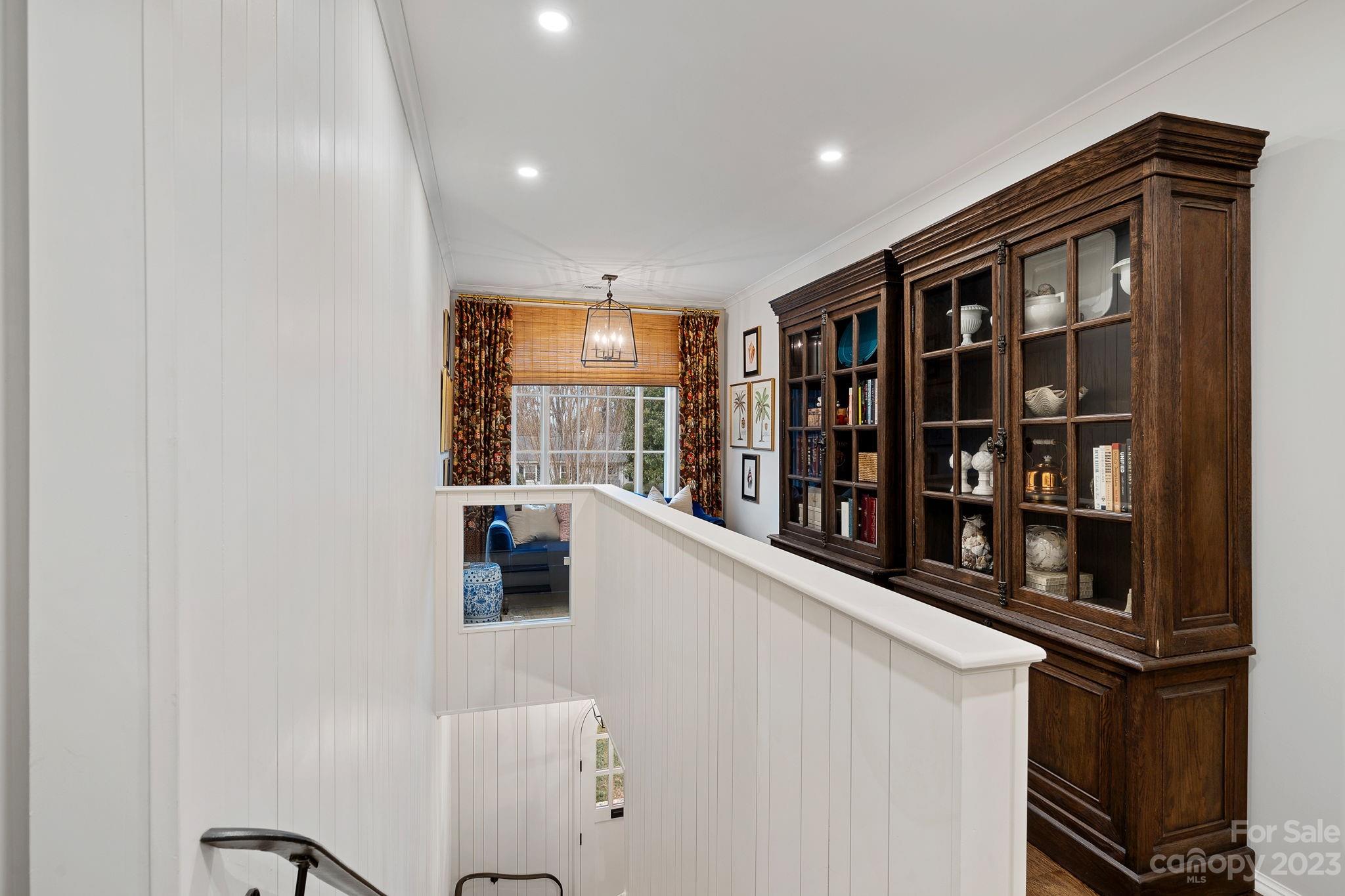 1401 Audubon Road Charlotte, NC 28211 - Photo 20 of 39 a hallway with wine cabinets