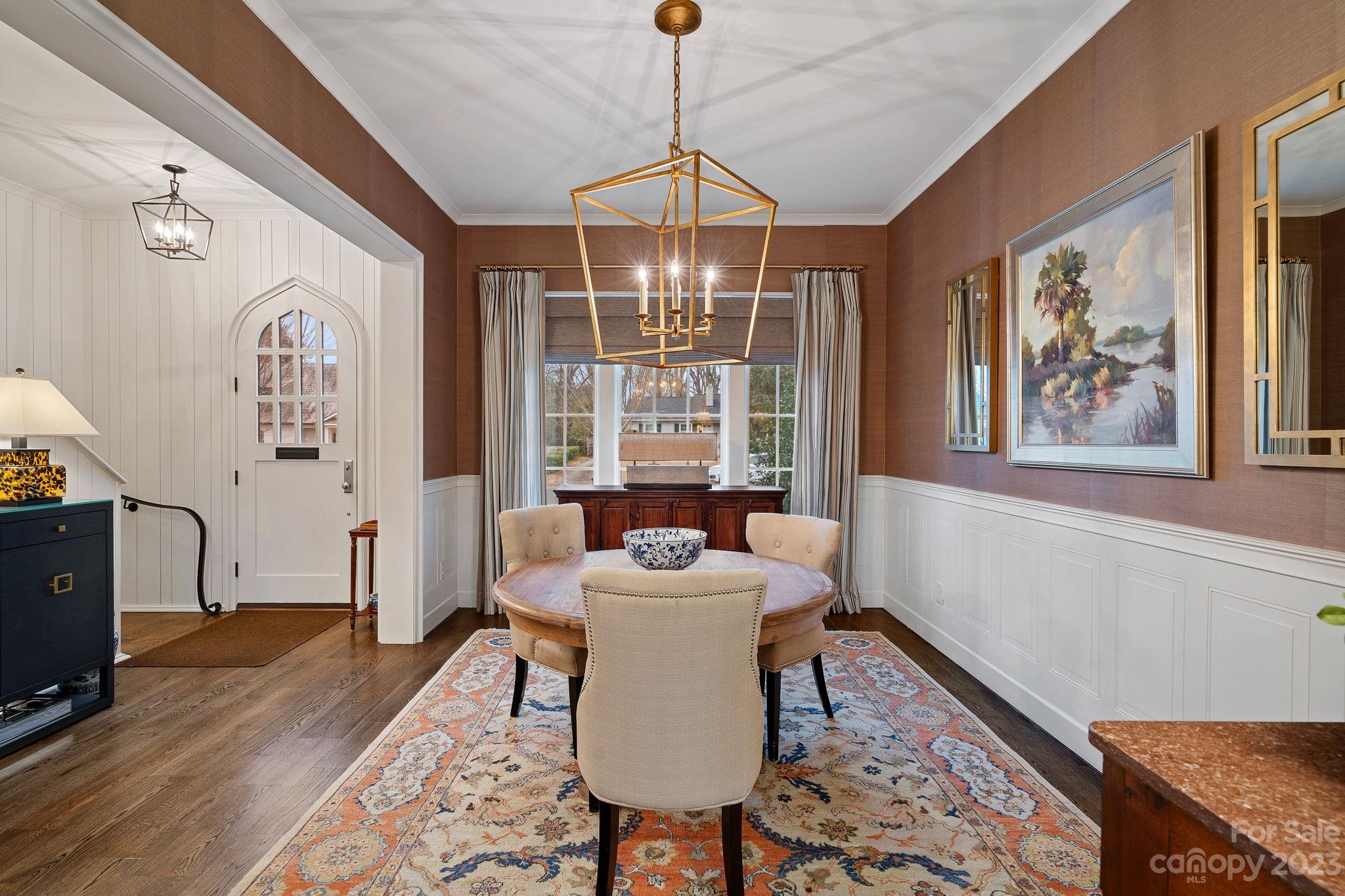 1401 Audubon Road Charlotte, NC 28211 - Photo 5 of 39 a dining room with furniture window and wooden floor