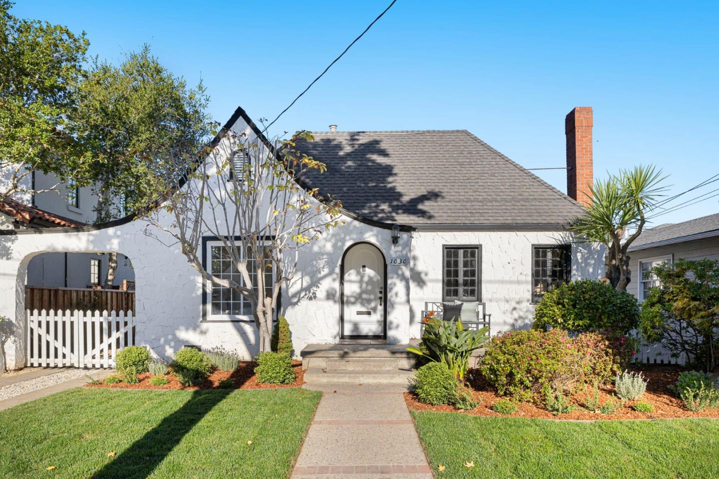 1030 Morrell Avenue Burlingame, CA 94010 - Photo 1 of 37 a front view of a house with garden