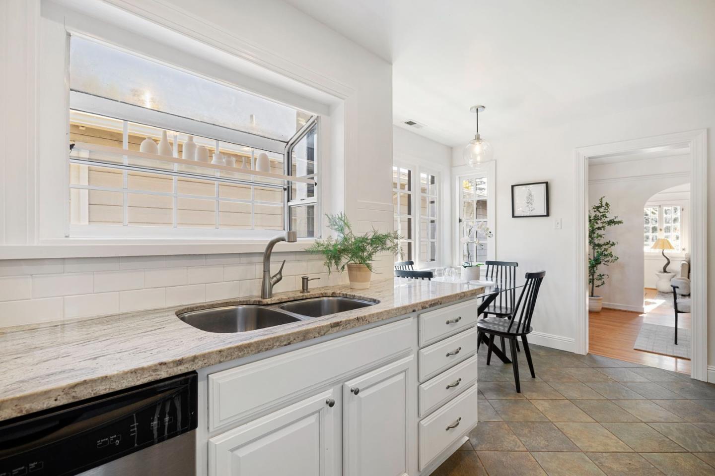 1030 Morrell Avenue Burlingame, CA 94010 - Photo 14 of 37 a kitchen with a sink and cabinets