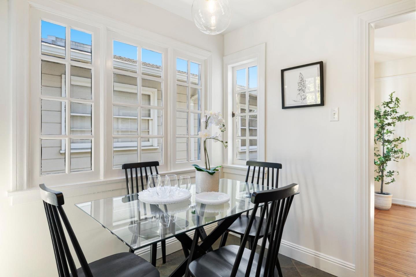 1030 Morrell Avenue Burlingame, CA 94010 - Photo 15 of 37 a view of a dining room with furniture and wooden floor