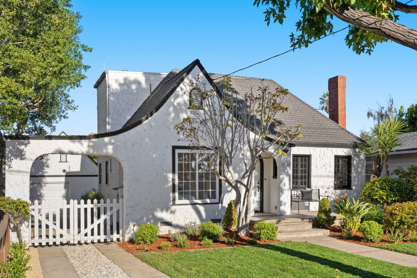 1030 Morrell Avenue Burlingame, CA 94010 - Photo 2 of 37 a front view of a house with garden