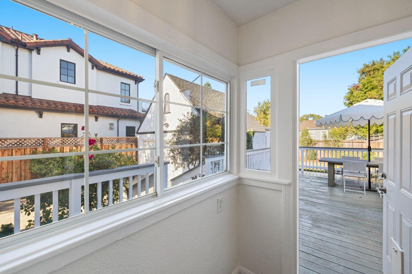1030 Morrell Avenue Burlingame, CA 94010 - Photo 26 of 37 a view of a balcony with chairs and potted plants