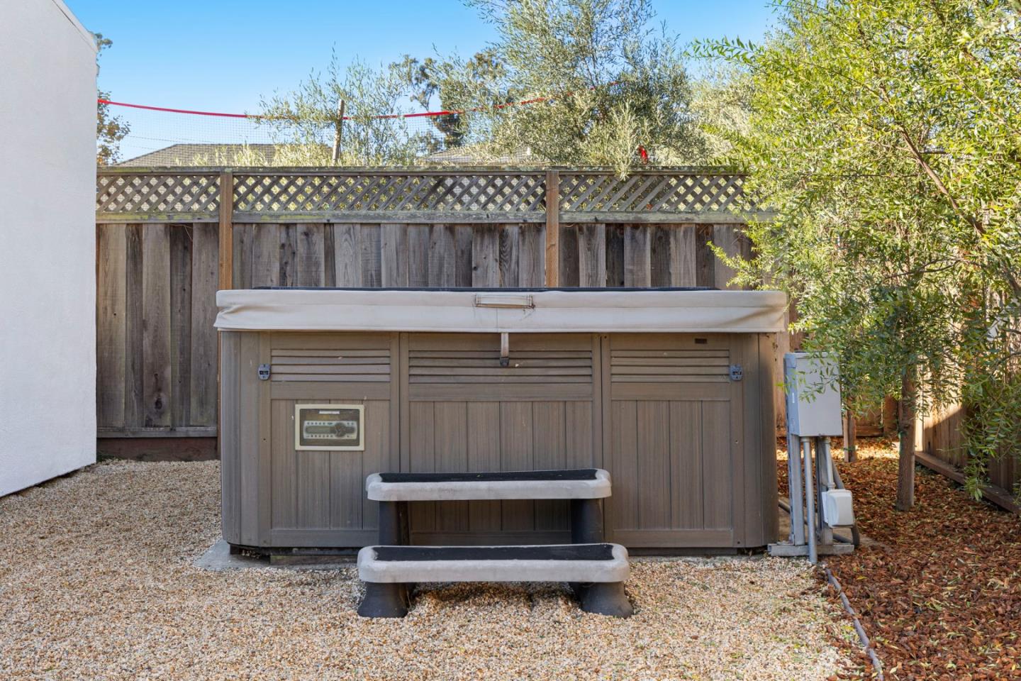 1030 Morrell Avenue Burlingame, CA 94010 - Photo 32 of 37 a view of house and outdoor space with wooden fence