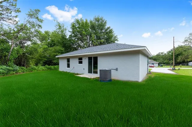 a house view with a garden space