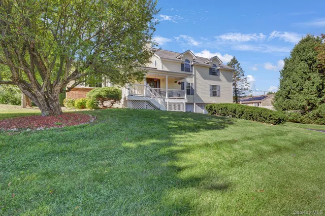 a view of a house with a big yard