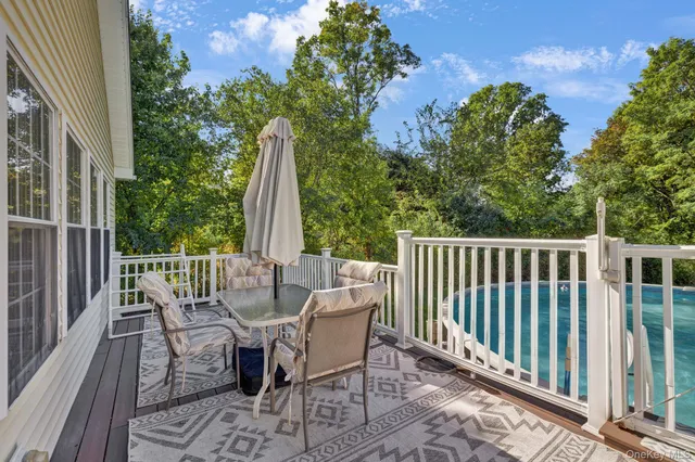 a view of a house with a yard and garage
