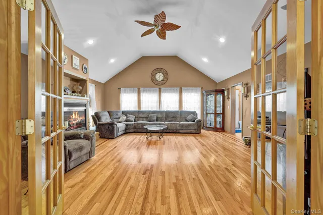 a view of a living room and hardwood floor