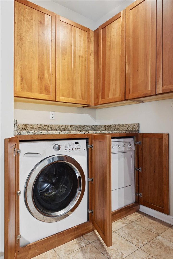 5118 South Ingleside Avenue, Unit A Chicago, IL 60615 - Photo 14 of 16 a view of a utility room with washer and dryer