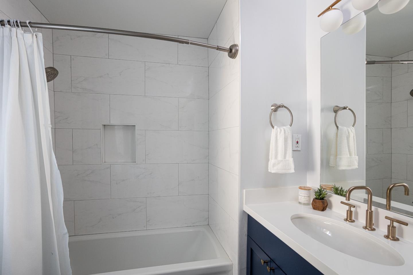 3961 Casanova Drive San Mateo, CA 94403 - Photo 11 of 14 a bathroom with a shower and a sink