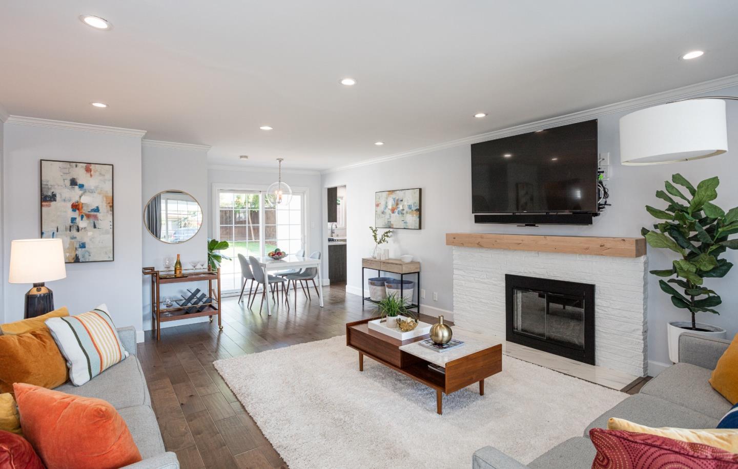3961 Casanova Drive San Mateo, CA 94403 - Photo 2 of 14 a living room with furniture and a fireplace