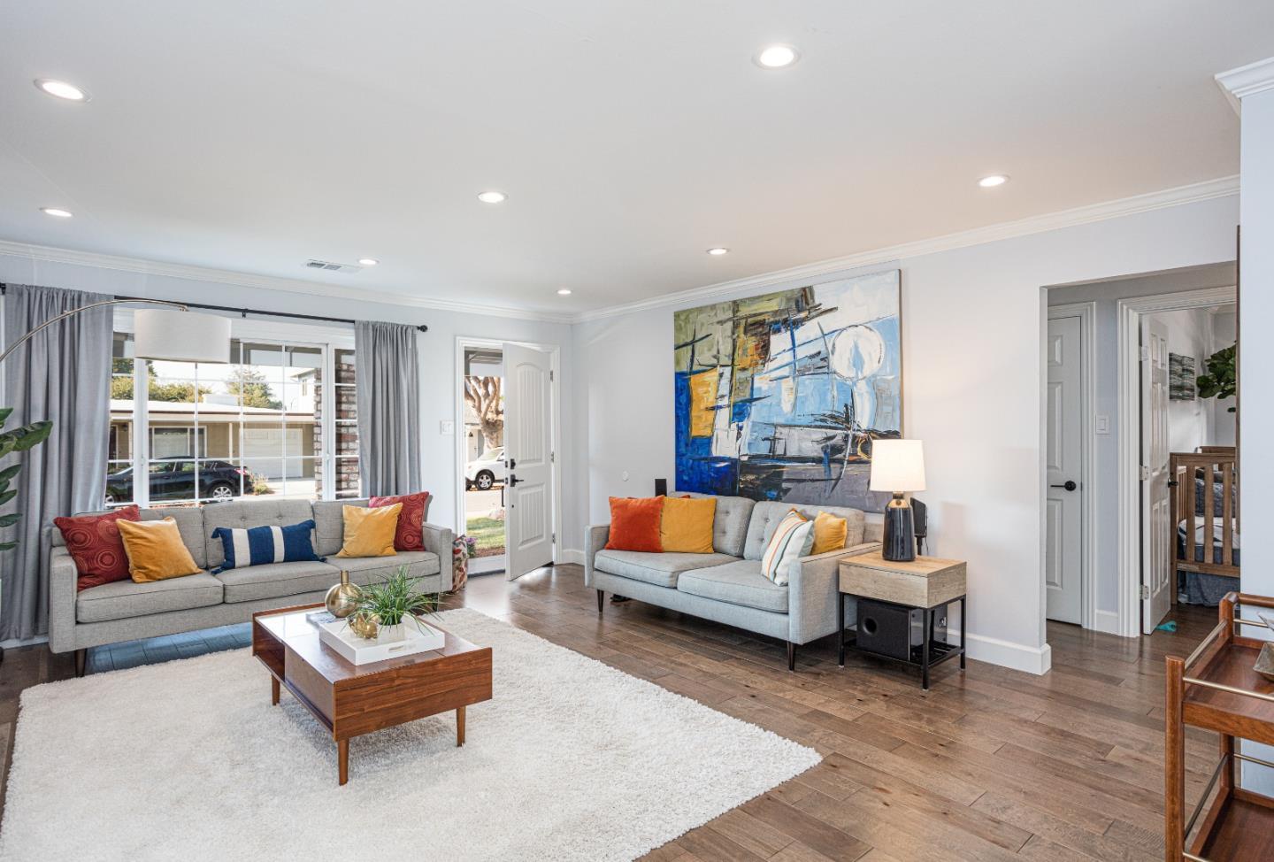 3961 Casanova Drive San Mateo, CA 94403 - Photo 3 of 14 a living room with furniture and a couch