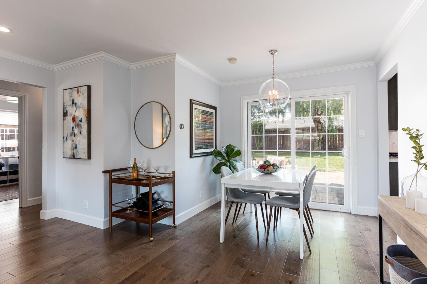 3961 Casanova Drive San Mateo, CA 94403 - Photo 5 of 14 a view of a dining room with furniture window and wooden floor