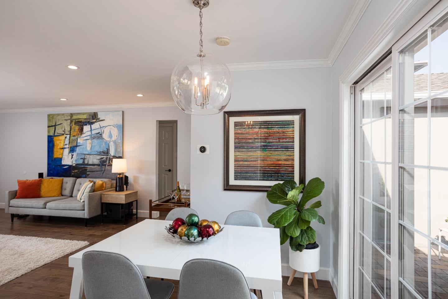 3961 Casanova Drive San Mateo, CA 94403 - Photo 7 of 14 a living room with furniture and a chandelier