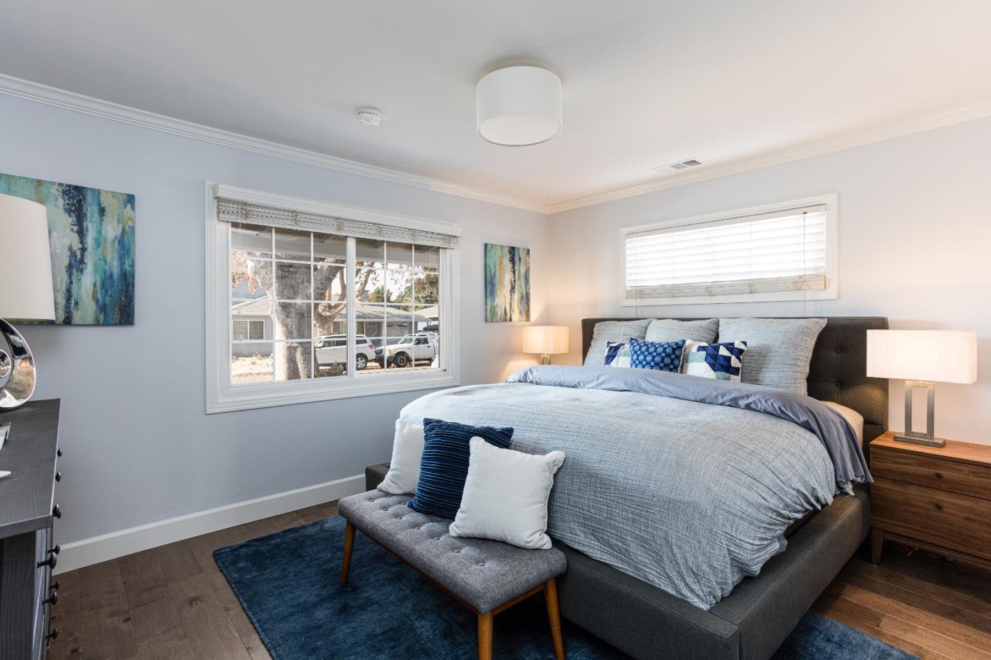 3961 Casanova Drive San Mateo, CA 94403 - Photo 8 of 14 a bedroom with a bed and wooden floor