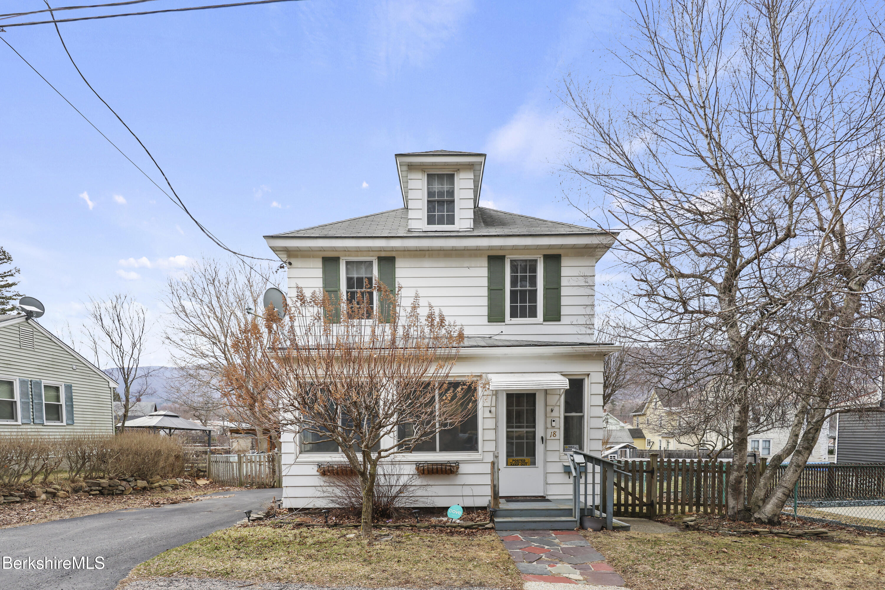 Undisclosed Address Adams, MA 01220 - Photo 1 of 33 a front view of a house with a yard