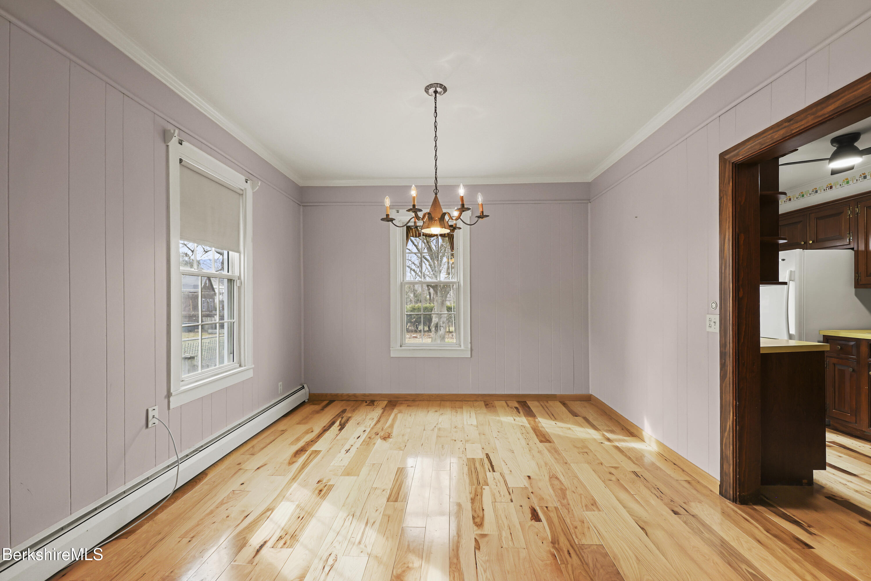 Undisclosed Address Adams, MA 01220 - Photo 12 of 33 a view of empty room with wooden floor and fan