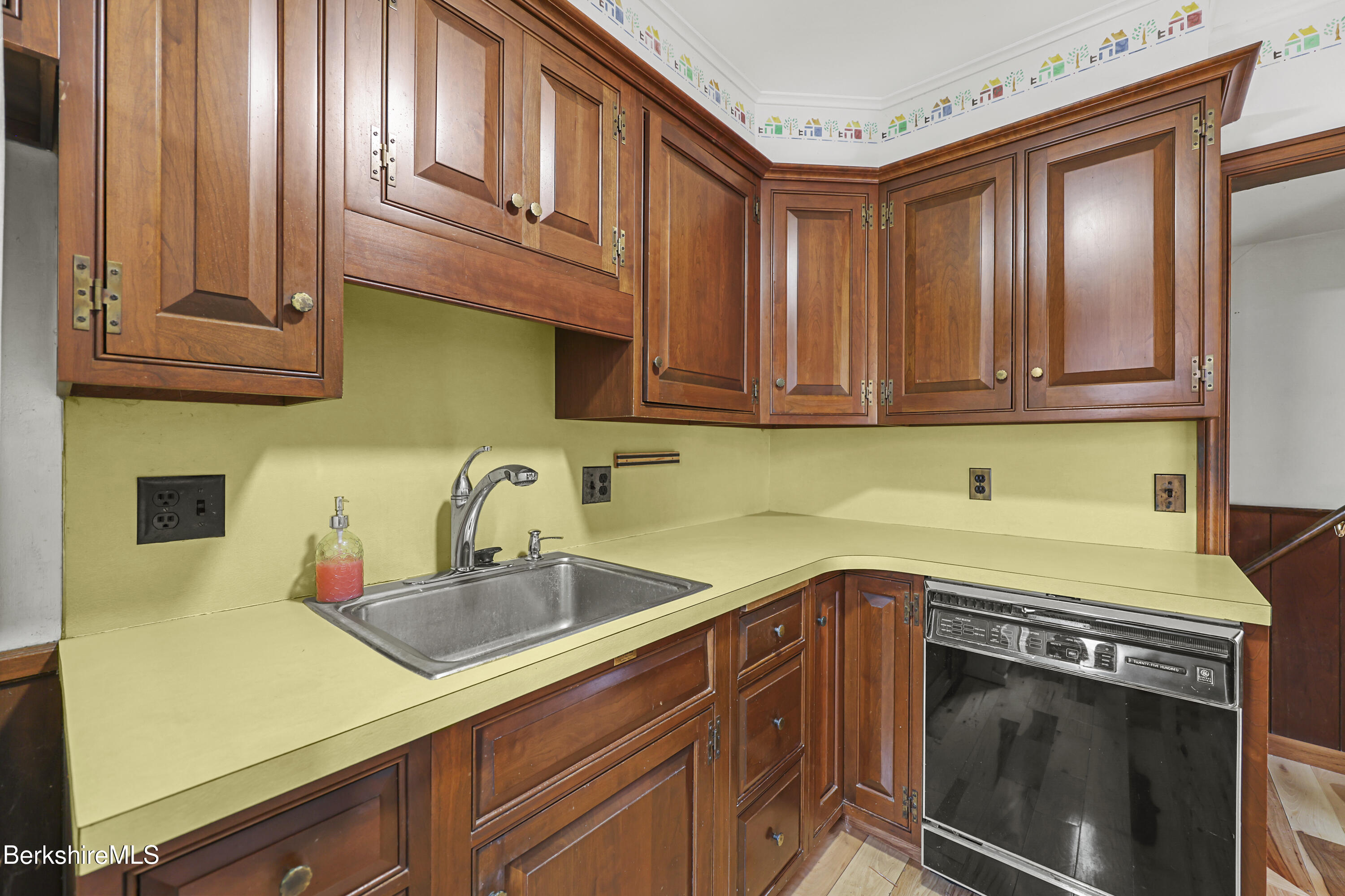 Undisclosed Address Adams, MA 01220 - Photo 13 of 33 a kitchen with stainless steel appliances granite countertop a sink a stove and cabinets