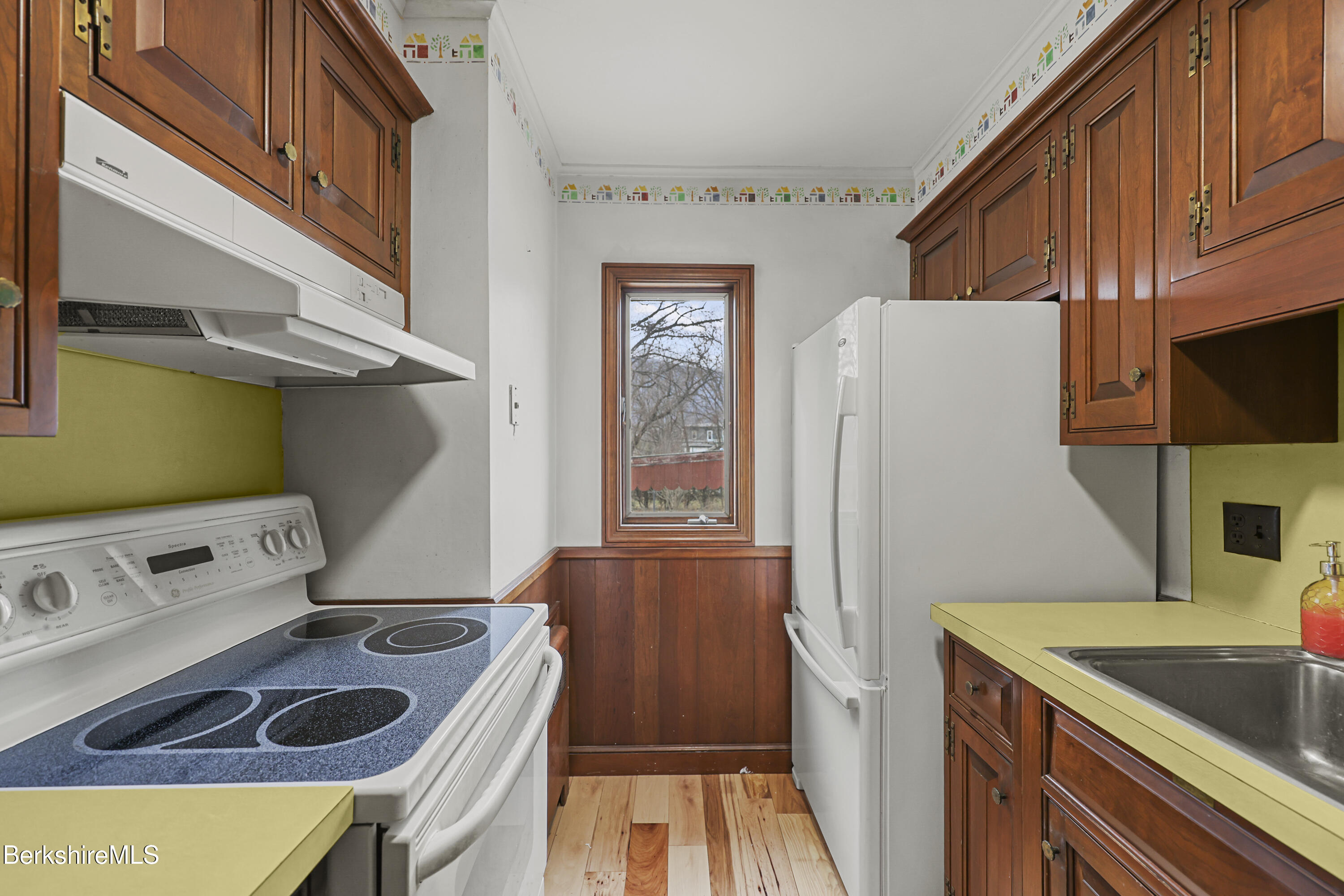 Undisclosed Address Adams, MA 01220 - Photo 15 of 33 a kitchen with stainless steel appliances granite countertop a sink stove and refrigerator