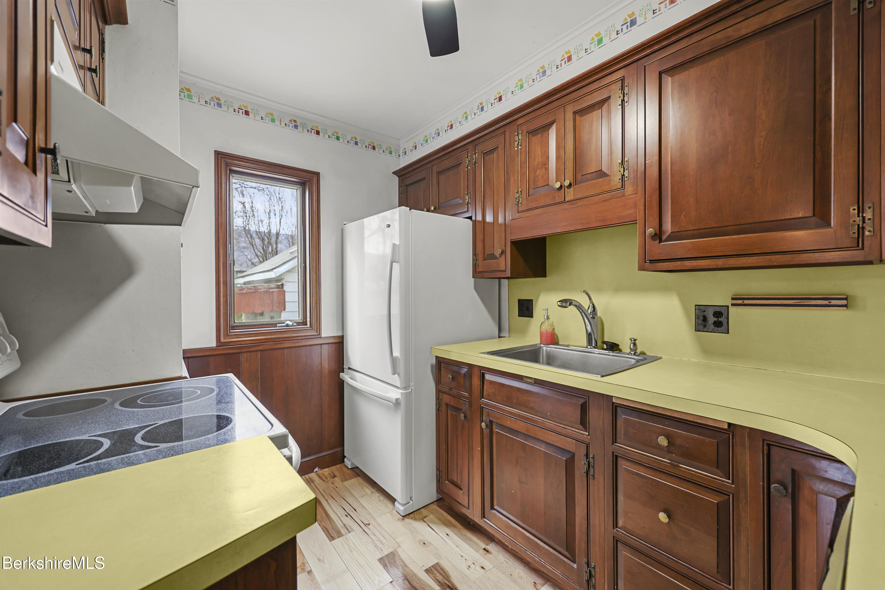 Undisclosed Address Adams, MA 01220 - Photo 16 of 33 a kitchen with stainless steel appliances granite countertop a sink refrigerator and cabinets