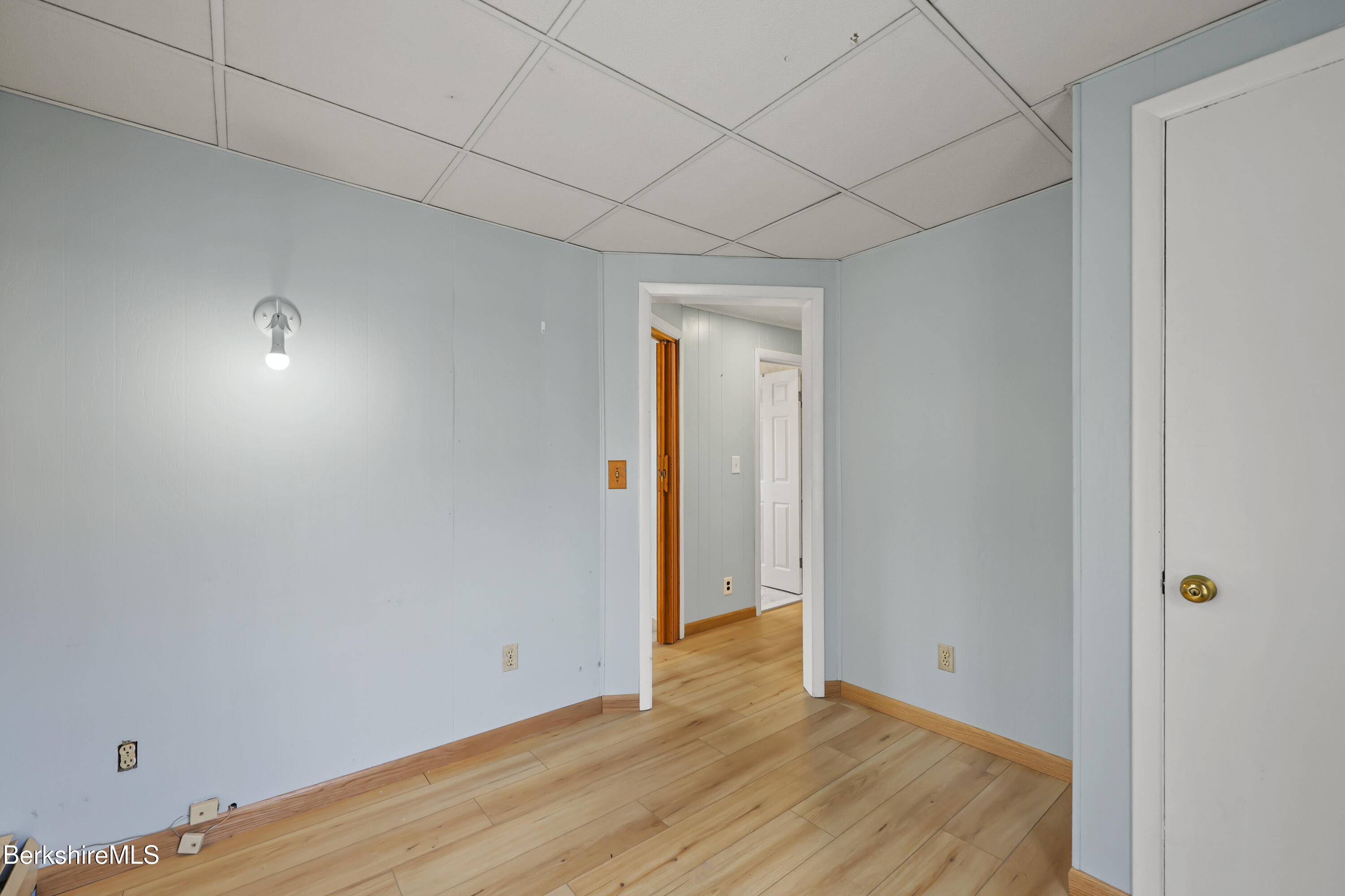 Undisclosed Address Adams, MA 01220 - Photo 23 of 33 a view of an empty room with wooden floor