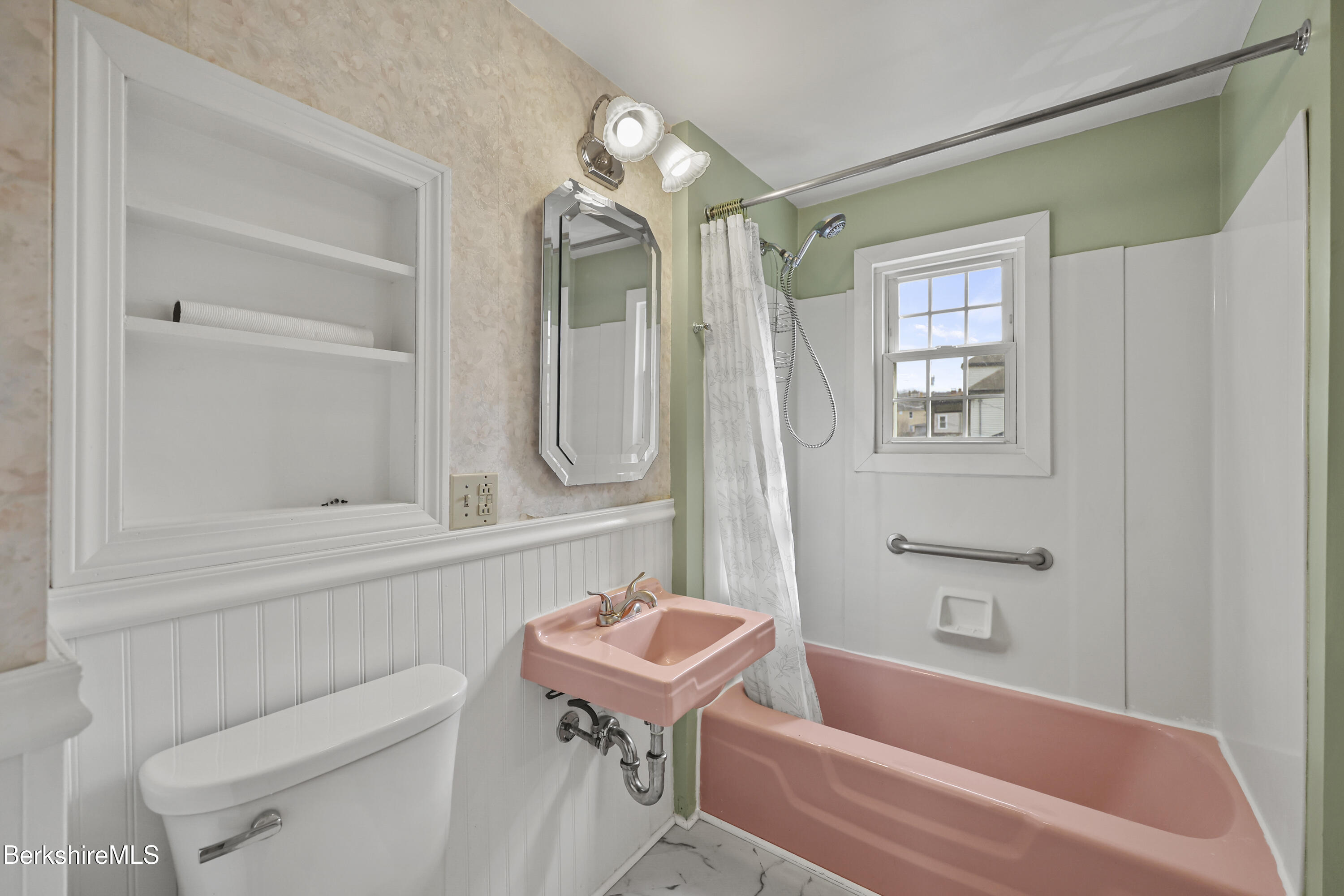 Undisclosed Address Adams, MA 01220 - Photo 26 of 33 a bathroom with a bath tub a sink and a large mirror