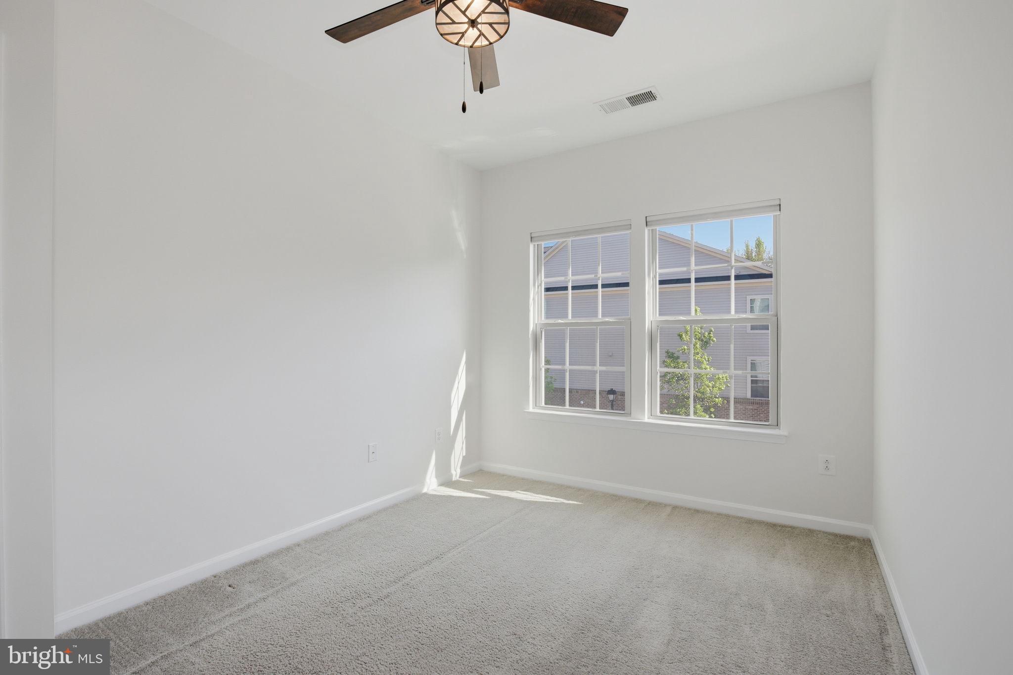 2784 Fredericksburg Road Hanover, MD 21076 - Photo 42 of 60 an empty room with windows