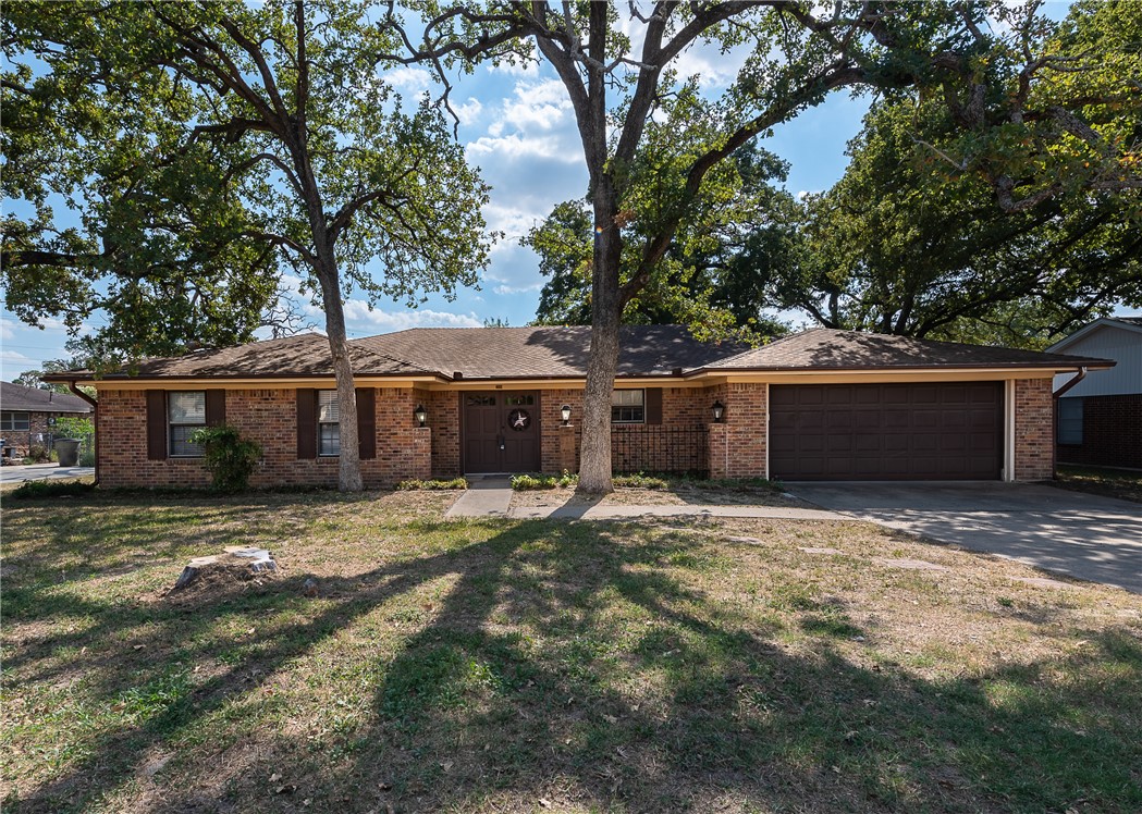 2106 Barak Lane Bryan, TX 77802 - Photo 1 of 27 a house view with a sitting space