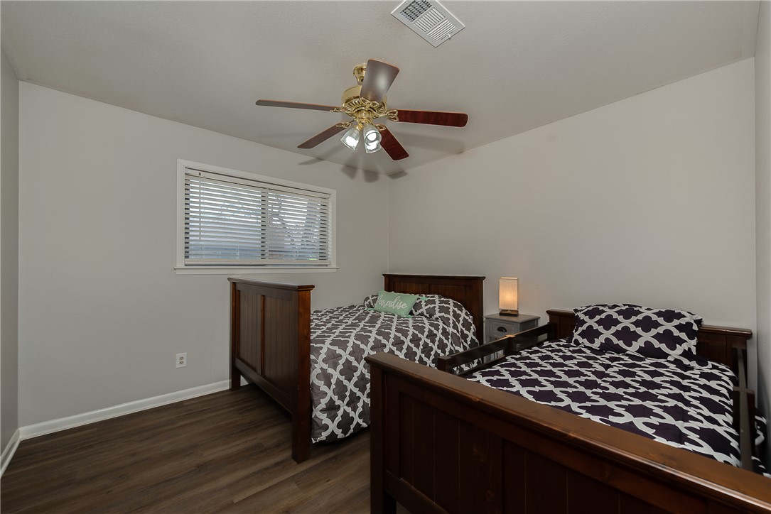 2106 Barak Lane Bryan, TX 77802 - Photo 16 of 27 a bedroom with bed and window