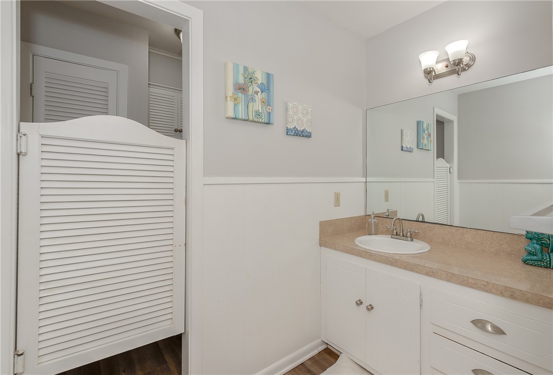 2106 Barak Lane Bryan, TX 77802 - Photo 17 of 27 a bathroom with a sink and a mirror