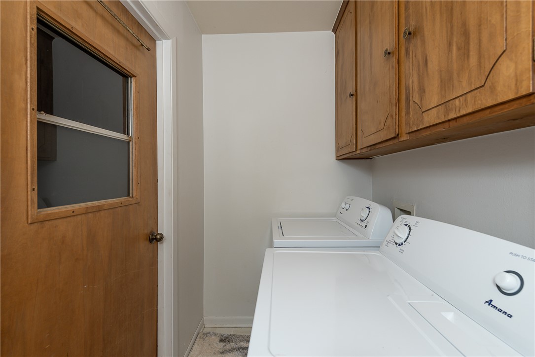 2106 Barak Lane Bryan, TX 77802 - Photo 23 of 27 a utility room with a sink