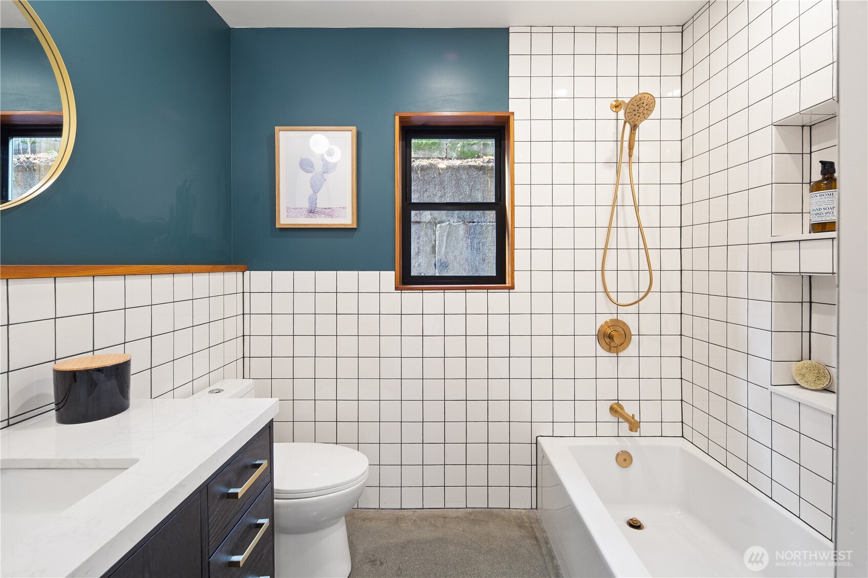 328 Northeast 55th Street Seattle, WA 98105 - Photo 21 of 35 a bathroom with a sink toilet and shower
