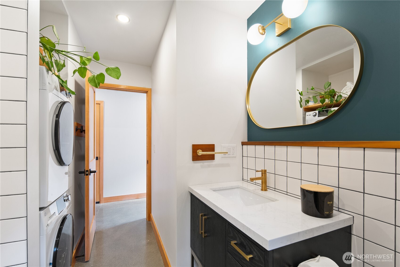 328 Northeast 55th Street Seattle, WA 98105 - Photo 22 of 35 a bathroom with a sink mirror and vanity