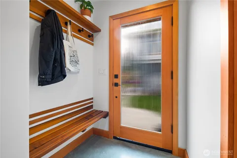 a view of an entryway with a workspace