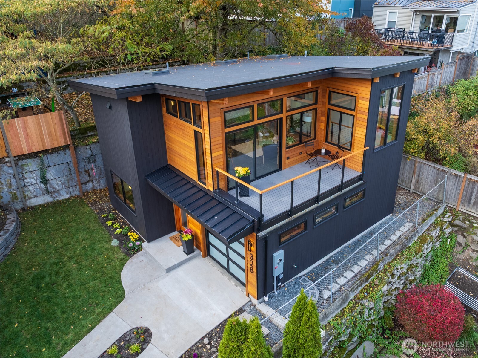 328 Northeast 55th Street Seattle, WA 98105 - Photo 27 of 35 an aerial view of a house with a yard